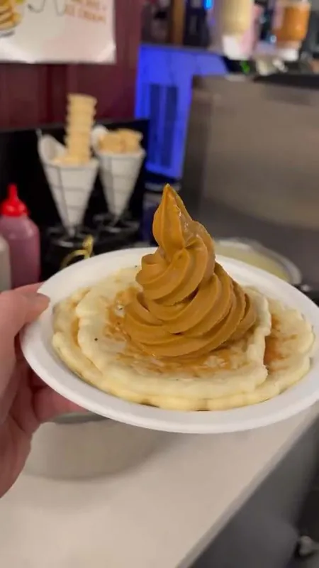 Pancake topped with a caramel soft serve swirl