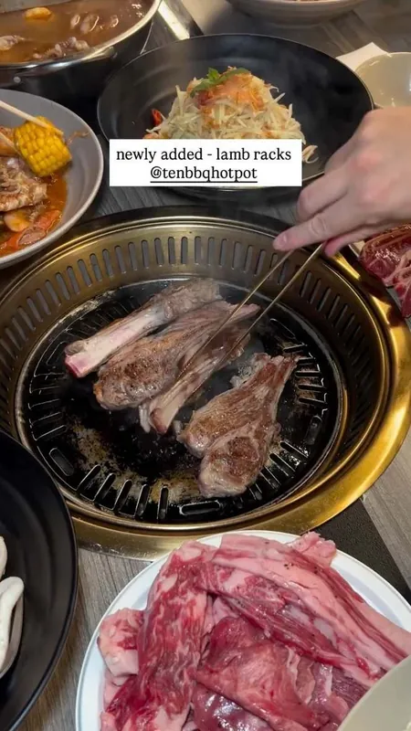 Grilled lamb racks on the tabletop BBQ