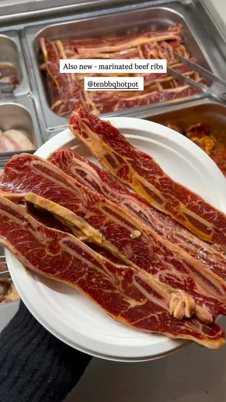 Marinated marbled beef ribs on a plate